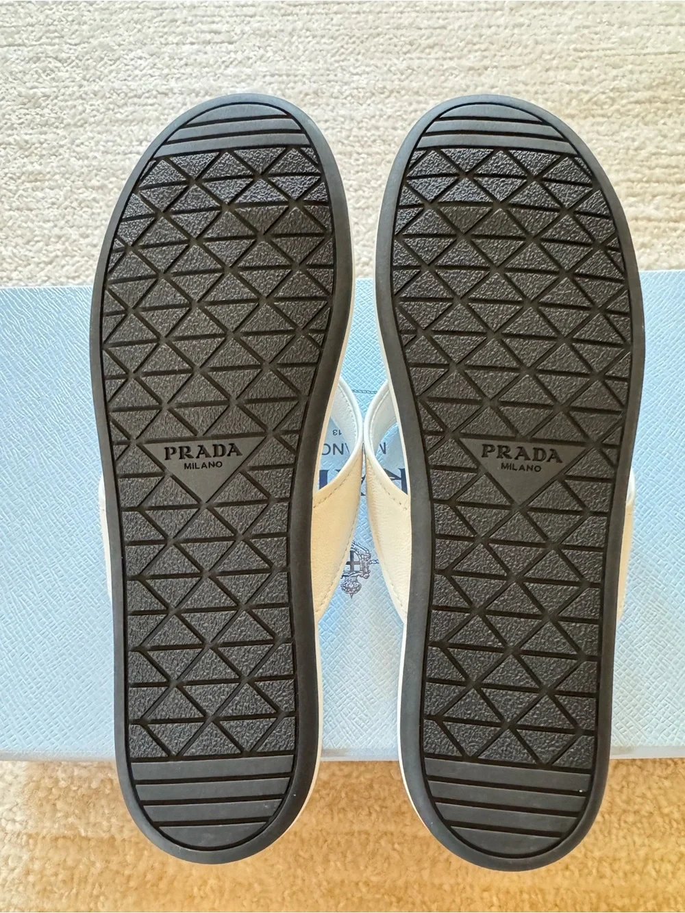 Prada designer white Leather Thong Sandals with Gold Triangle Logo